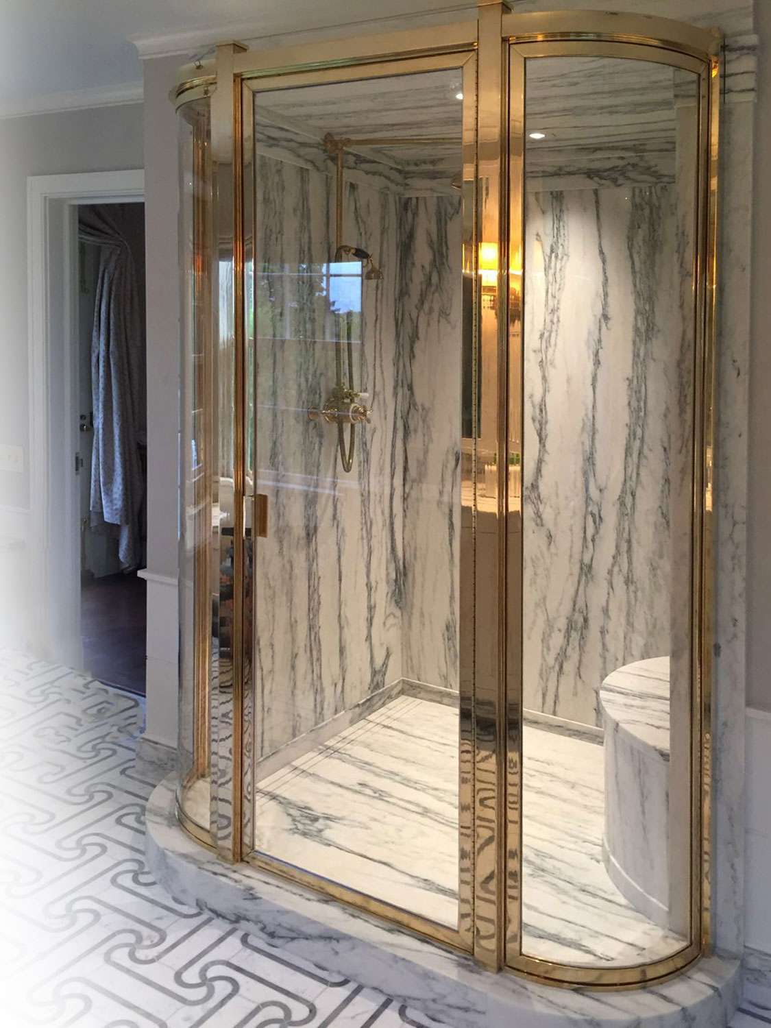 Curved Glass Panels with Solid Polished Unlacquered Brass finish