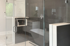 Custom glass shower with hinges glass to glass left view