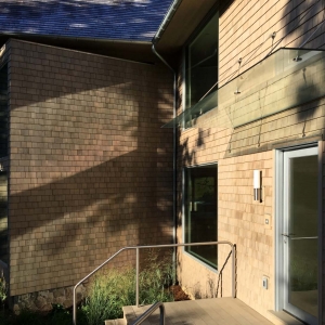 Custom glass awning, exterior private residence in Darien