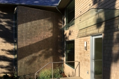 Custom glass awning, exterior private residence in Darien