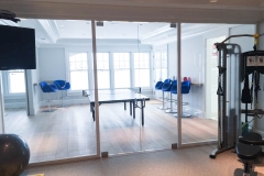 Custom glass gym and recreation room glass doors